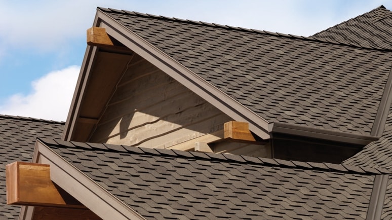 Owens Corning premium Woodmoor shingles in brown on a roof