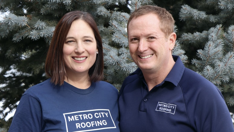 Metro City Roofing management team with green pine tree in the background
